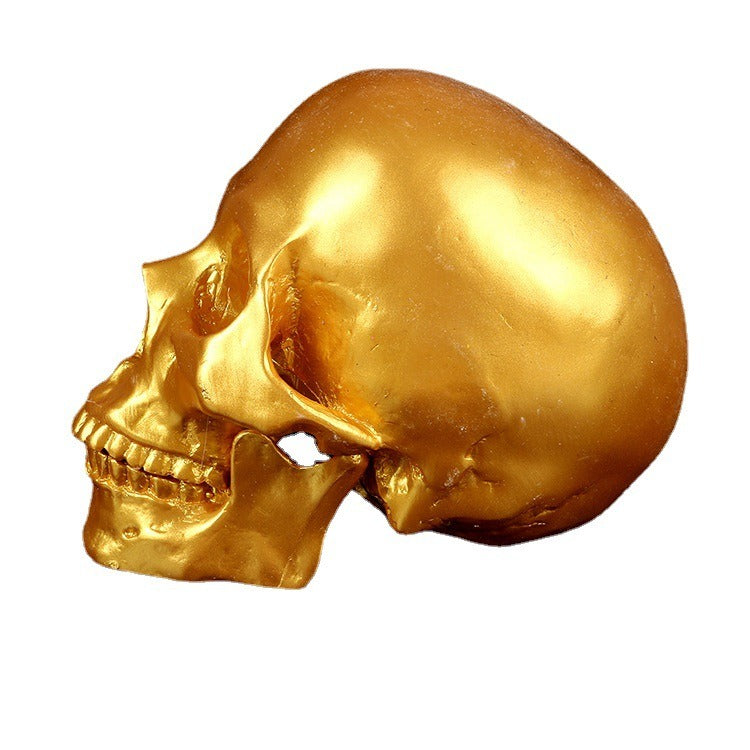 Golden medical resin skull ornament